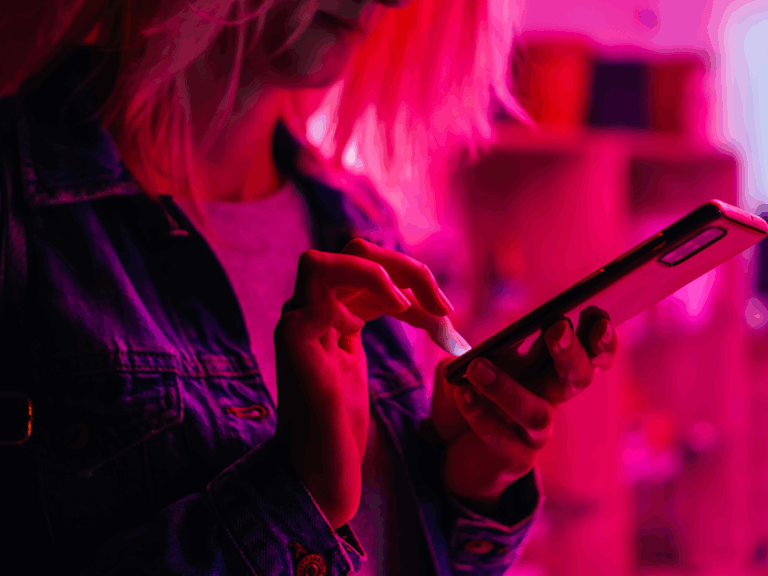 Woman using open banking on her phone