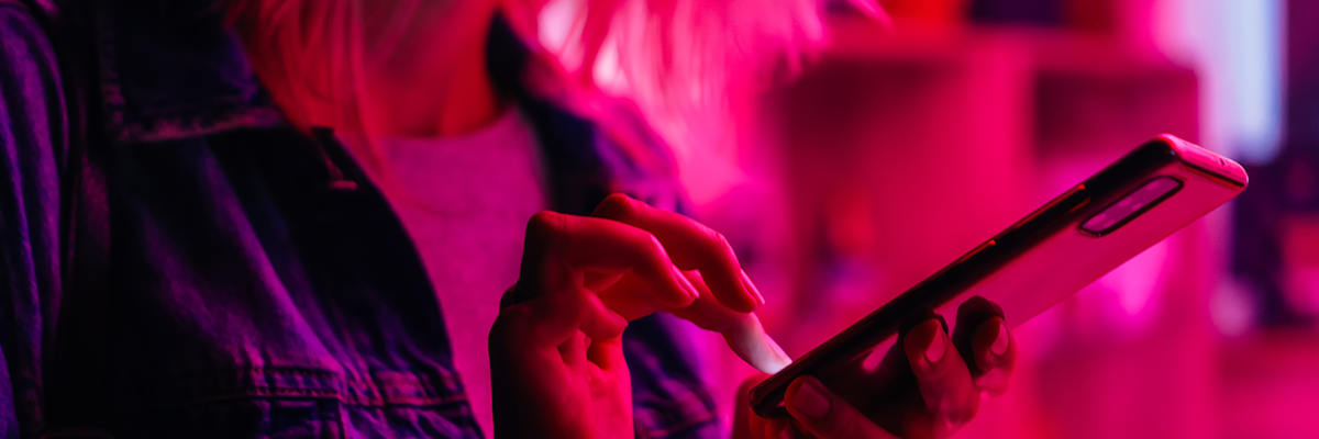 Woman using pay by bank on her phone